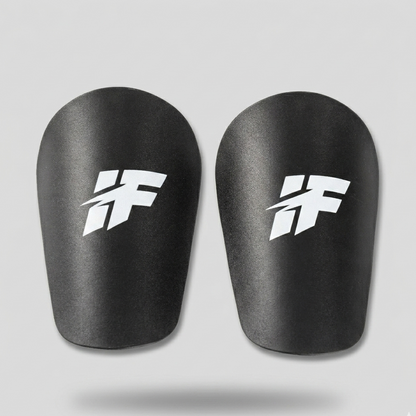 Icon Mini Canilleras - Proteccion ultraligera carbon-flex para futbol